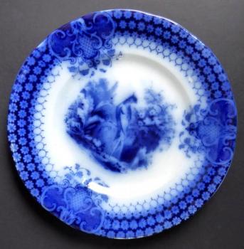 Blue stoneware plate with a peacock -Sarreguemines Blue stoneware plate with a peacock -Sarreguemines