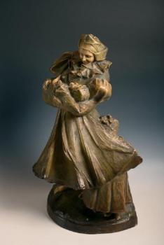 Woman in traditional dress with two children Woman in traditional dress with two children